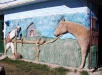 Mural con relieve en una casa de San Gregorio